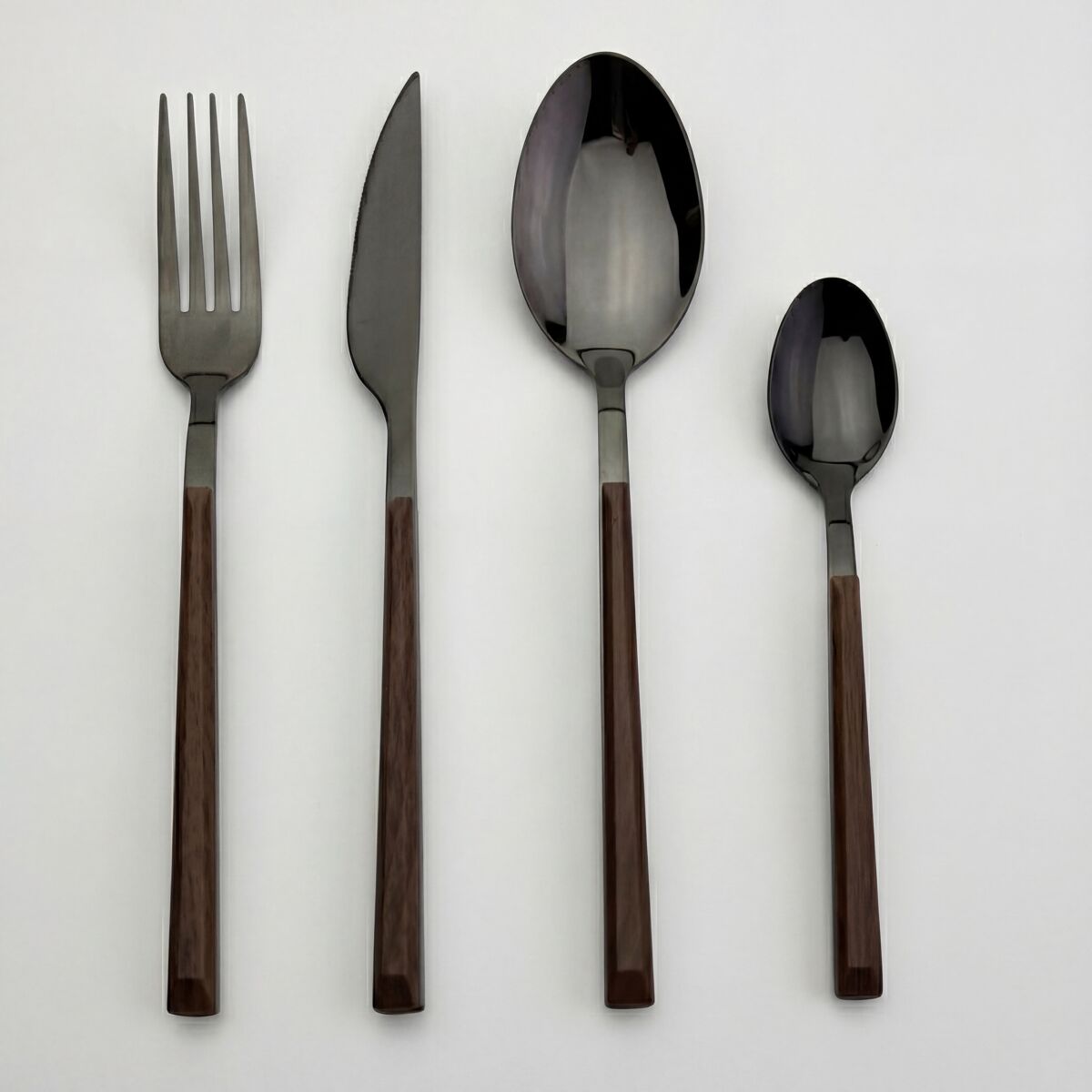 Cuberteria especial black de acero inoxidable 16 piezas conforama