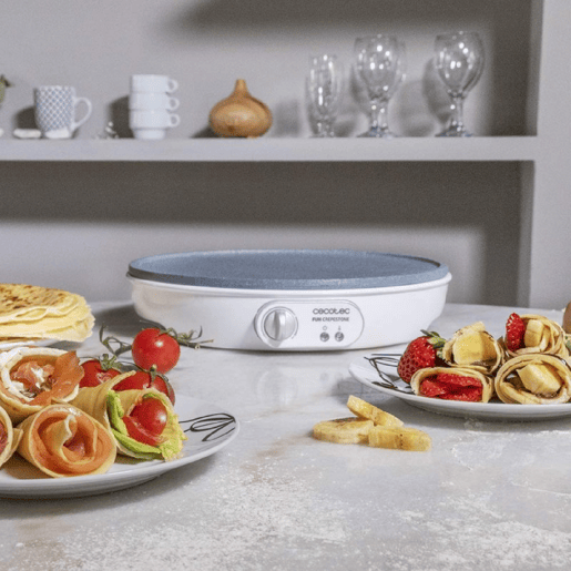 Cecotec Máquina para crepes de 1000 W com revestimento RockStone e potência regulável. Cecotec Máquina para crepes de 1000 W com revestimento RockStone e potência regulável.