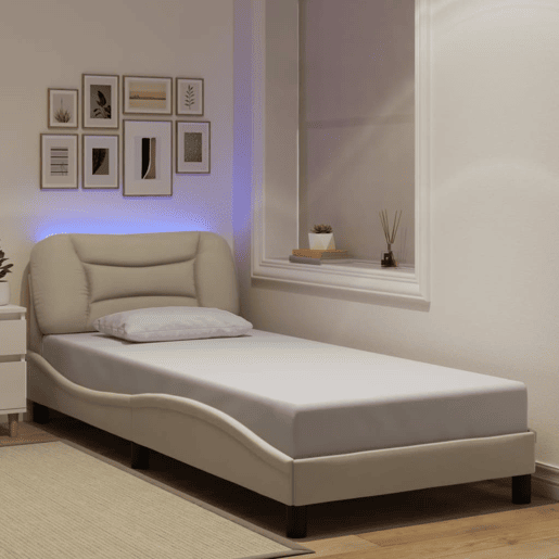 Estrutura de cama de solteiro para adultos com LED 90x200 cm tecido creme