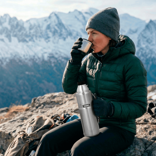 Garrafa térmica Thermos em aço inoxidável 1,2L prateada com pega