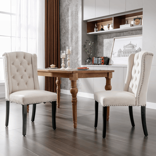 Conjunto de 2 cadeiras de veludo com pernas de carvalho - decoradas com rebites - Bege Conjunto de 2 cadeiras de veludo com pernas de carvalho - decoradas com rebites - Bege