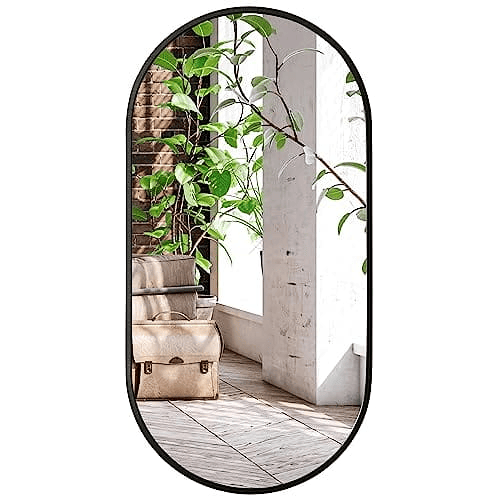 O espelho oval com moldura em alumínio é adequado para qualquer divisão, incluindo a casa de banho. Os laços de montagem permitem que o espelho seja pendurado horizontal e verticalmente.