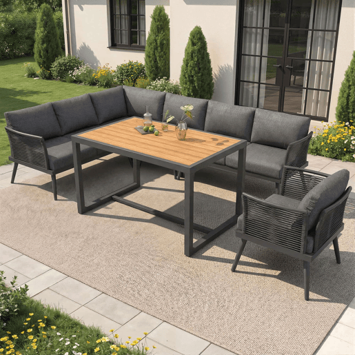 Sofá de jardim de canto com 7 lugares, com mesa de centro e poltrona - Conjunto modular resistente às intempéries, com estrutura de ferro, braços trançados e almofadas - Cinzento Sofá de jardim de canto com 7 lugares, com mesa de centro e poltrona - Conjunto modular resistente às intempéries, com estrutura de ferro, braços trançados e almofadas - Cinzento