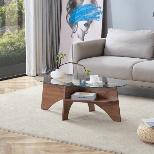 Mesa de café ovalada - 104,9 x 60 cm - Estrutura em madeira de nogueira com prateleiras dispostas diagonalmente e nível de armazenamento integrado - Cor transparente, nogueira