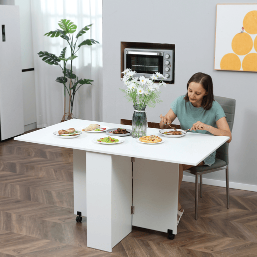 HOMCOM Mesa de Sala de Jantar Dobrável Mesa de Madeira com 2 Prateleiras de Armazenamento e Rodas para Cozinha 75x140x74 cm Branco