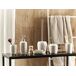 Beliani Conjunto de accesorios de baño PALMILLA Beliani Conjunto de accesorios de baño PALMILLA Blanco/ Beige
