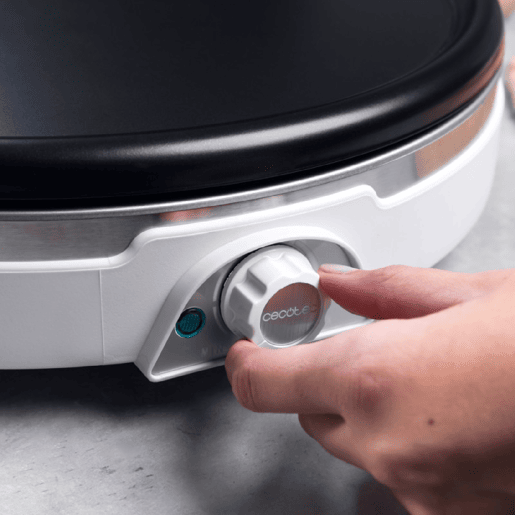 Cecotec Máquina de crepes XL em aço inoxidável, com 1350 W, placa facilmente removível e apta para limpeza rápida na máquina da louça. Cecotec Máquina de crepes XL em aço inoxidável, com 1350 W, placa facilmente removível e apta para limpeza rápida na máquina da louça.