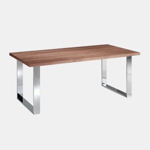 Mesa de jantar com tampo fixo em madeira folheada a nogueira e pés em aço inoxidável cromado.