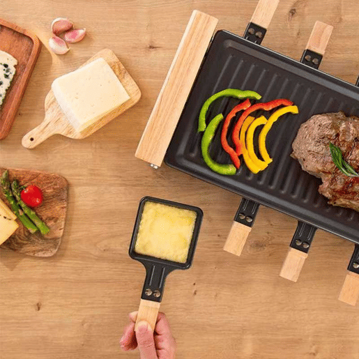 Cecotec Máquina de raclette para 8 pessoas com grill de 1200 W. Com estrutura de madeira, termóstato ajustável e placa antiaderente e uma superfície de aço com revestimento de alta qualidade. Inclui 8 panelas pequenas antiaderentes. Cecotec Máquina de raclette para 8 pessoas com grill de 1200 W. Com estrutura de madeira, termóstato ajustável e placa antiaderente e uma superfície de aço com revestimento de alta qualidade. Inclui 8 panelas pequenas antiaderentes.