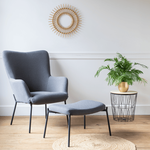 Sillón de tejido bouclé tela gris con reposapiés EIRA
