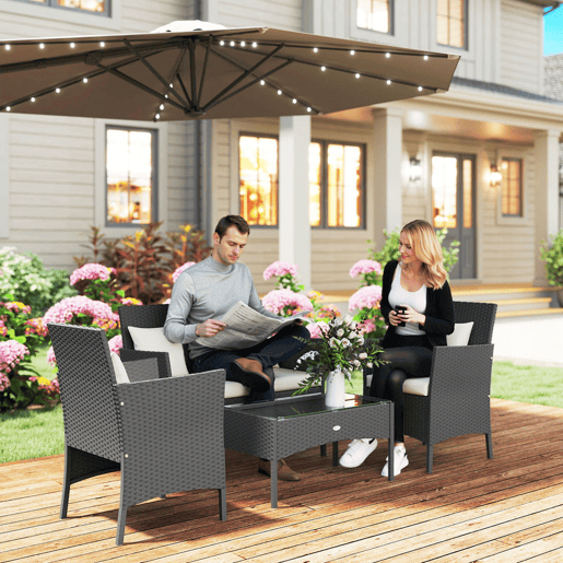 Outsunny Conjunto de Jardim de Vime Sintético Conjunto de 4 Peças Móveis de Jardim com 2 Poltronas 1 Sofá de 2 Lugares 1 Mesa de Centro com Tampo de Vidro e Almofadas Preto e Branco