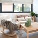 Sillón balancín de madera tapizado Sillón balancín de madera tapizado Beige