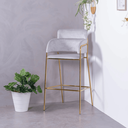Banqueta de design estofada em veludo e pernas douradas - Cruiser