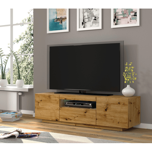 A mesa de TV AURA num estilo moderno. Mede 42x150x37 cm e inclui 4 prateleiras e 3 portas.