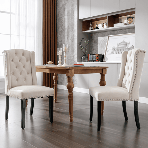 Conjunto de 2 cadeiras de veludo com pernas de carvalho - decoradas com rebites - Bege Conjunto de 2 cadeiras de veludo com pernas de carvalho - decoradas com rebites - Bege