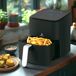 Freidora de Aire Sin Aceite Percutti 4L 1200W Display digital Freidora de Aire Sin Aceite Percutti 4L 1200W Display digital Negro