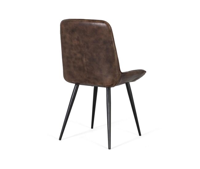 Silla elegante y moderna tapizada en piel color gris ceniza, con un acabado suave al tacto y resistente al uso diario. El respaldo y el asiento destacan por un detalle decorativo de costuras en forma de rombos, que aportan textura y un estilo cómodo.