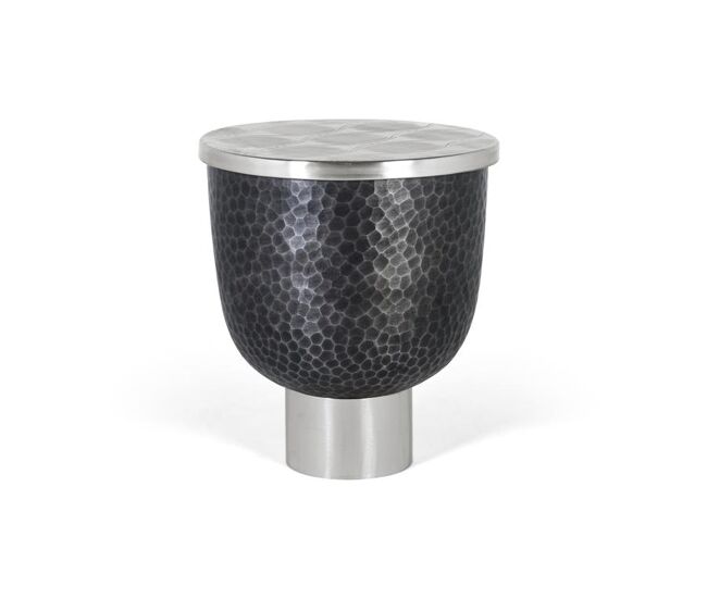 Mesa de centro redonda con un diseño estilo que combina modernidad y artesanía.