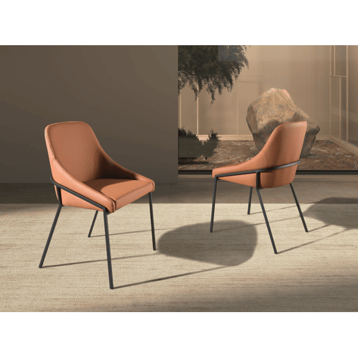 Cadeira de couro sintético laranja modelo 4161 Angel Cerdá S.L.Cadeira de design moderno com assento e encosto estofados em pele cor de laranja. Cadeira de couro sintético laranja modelo 4161 Angel Cerdá S.L.Cadeira de design moderno com assento e encosto estofados em pele cor de laranja.