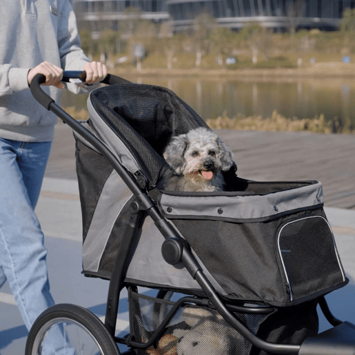 PawHut Carrinho para Cães Dobrável Carrinho para Animais de Estimação Carrinho para Cães Médios e Pequenos com Cesta de Armazenamento Capota Ajustável Janela de Malha e 3 Rodas Grandes 111x58x107 cm Cinza