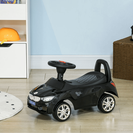 HOMCOM Carro Andador para Crianças de 18-36 Meses com Faróis Música Buzina Volante Compartimento de Armazenamento e Alça para Empurrar 63,5x28x36 cm Preto