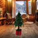 Árbol de Navidad luminoso con 25 LEDs y base en forma de regalo Árbol de Navidad luminoso con 25 LEDs y base en forma de regalo Verde