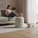 Pouf contenedor cilíndrico en terciopelo SNUGGO Pouf contenedor cilíndrico en terciopelo SNUGGO Crema